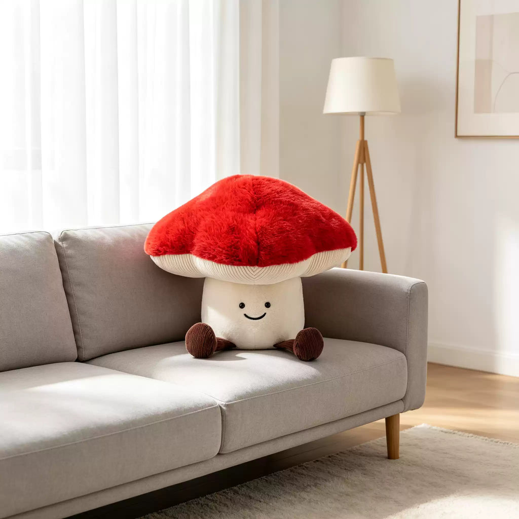Mushroom Plush, held in hand for scale