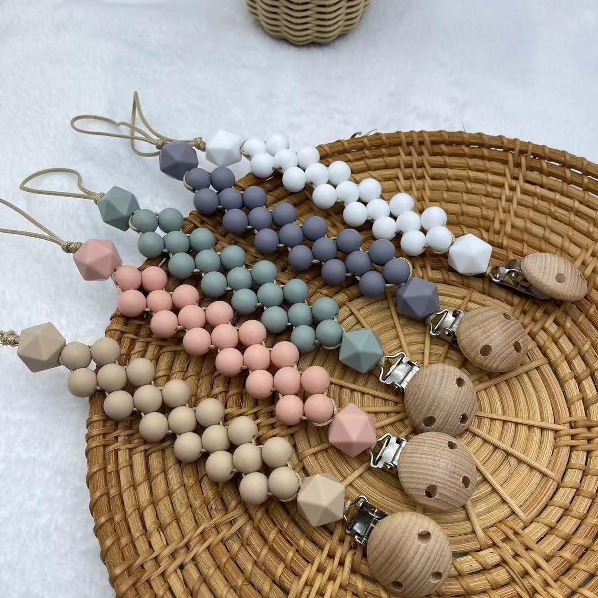 Silicone Flower Dummy Clip, Flat and Round Beads, close-up of the fabric texture