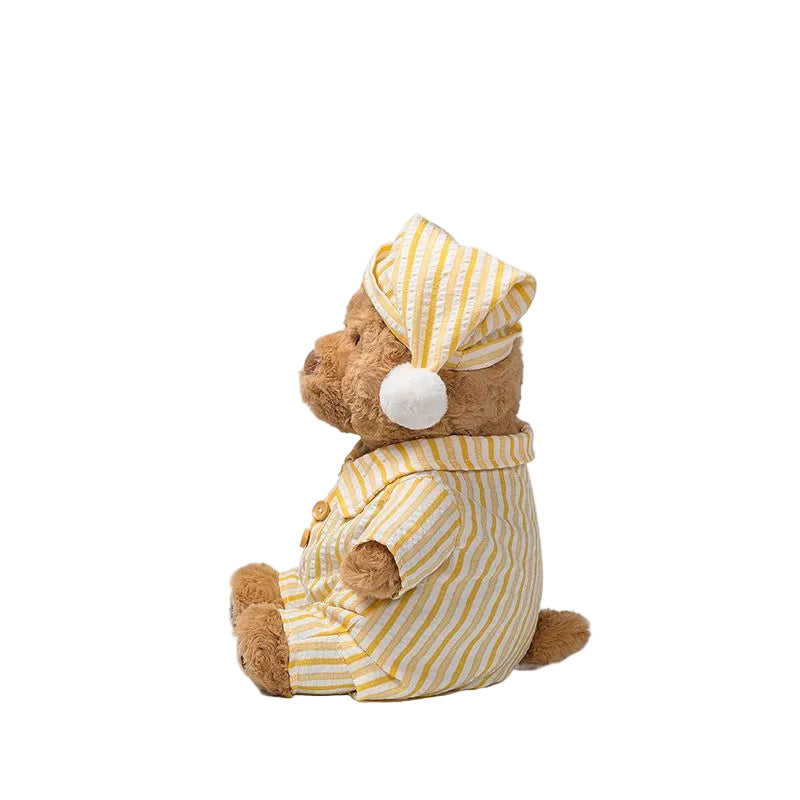 Pajama Teddy Bear Plush Toy, Soft Stuffed Bear in Striped Sleepwear & Cap, 25 cm, styled in a nursery setting
